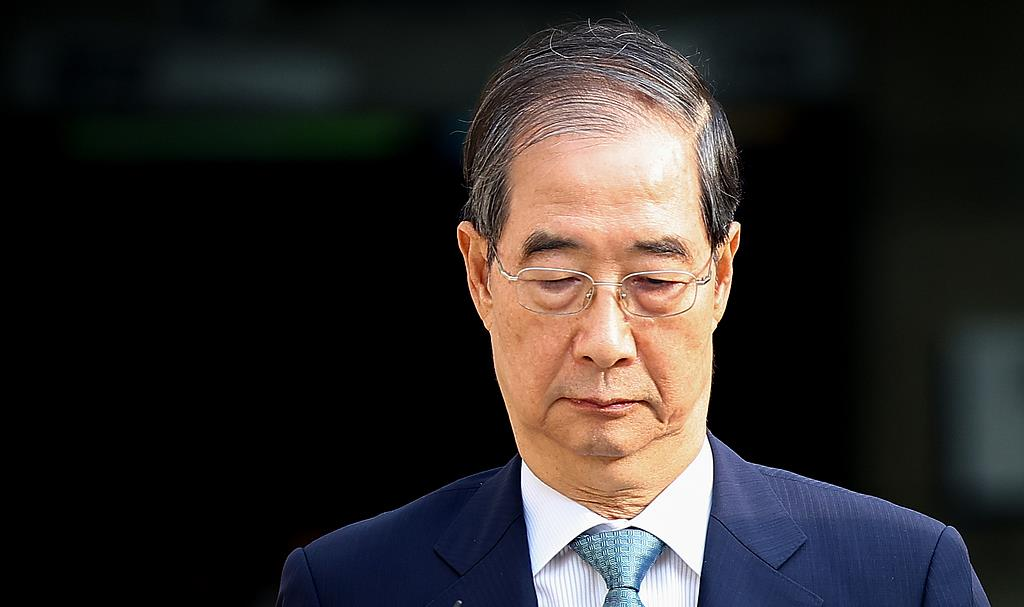 韩国前总理韩德洙涉内乱案二审被判15年-华闻时空